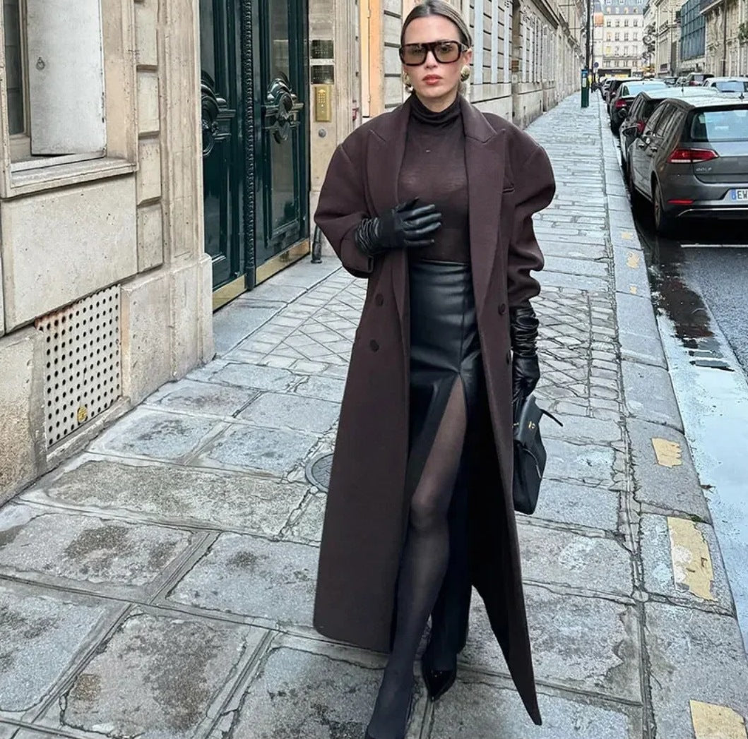 Double breasted coat with padded shoulders and lapel