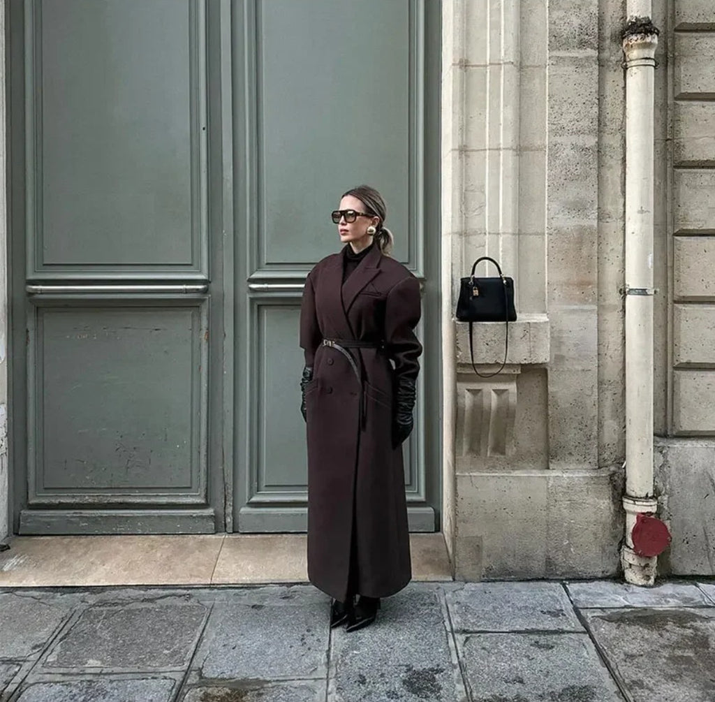 Double breasted coat with padded shoulders and lapel