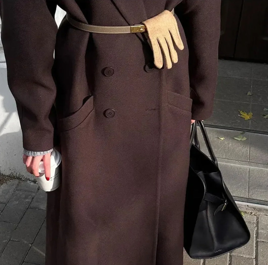 Double breasted coat with padded shoulders and lapel