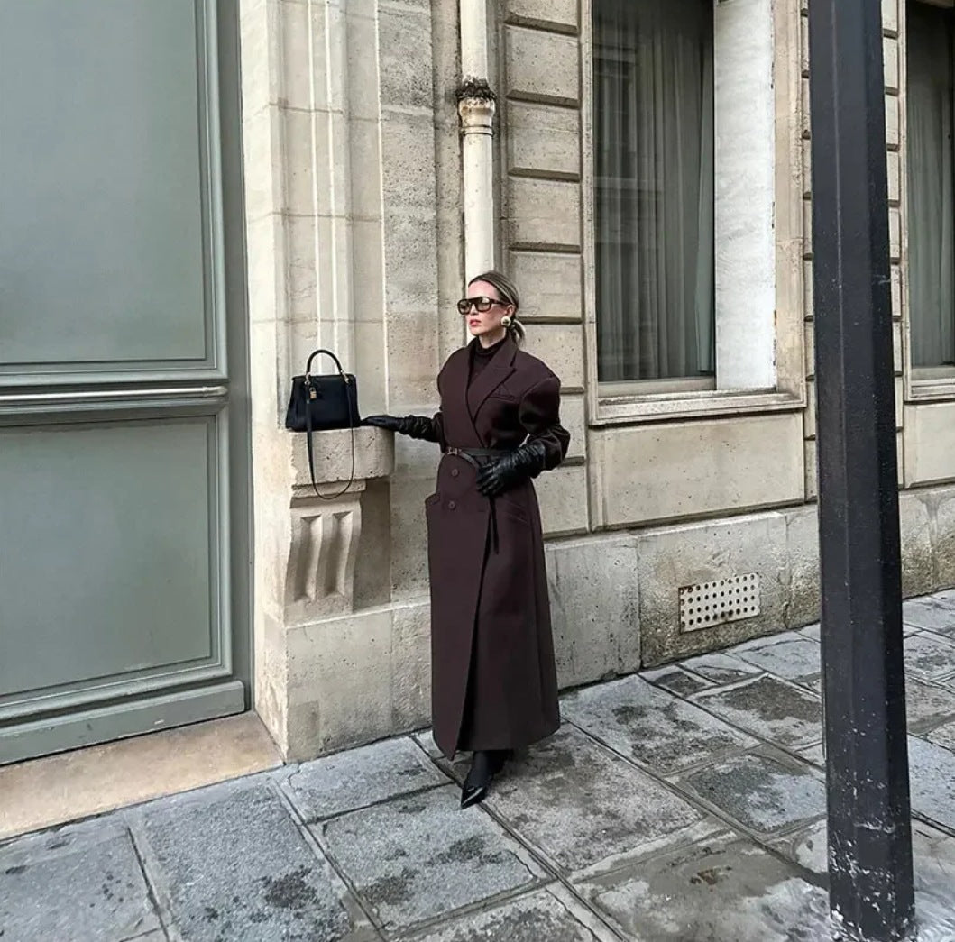 Double breasted coat with padded shoulders and lapel