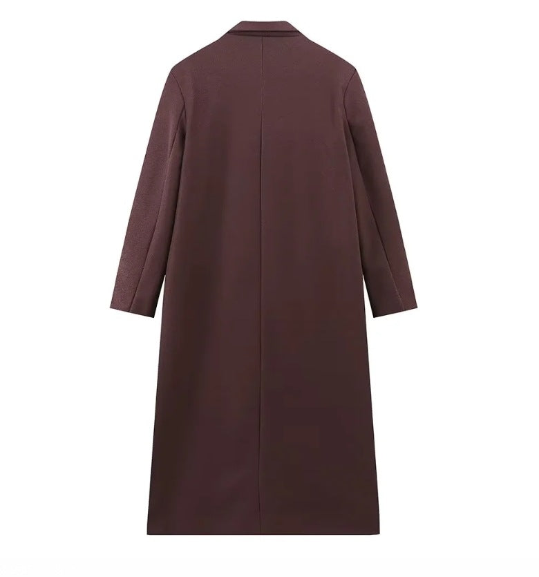 Double breasted coat with padded shoulders and lapel